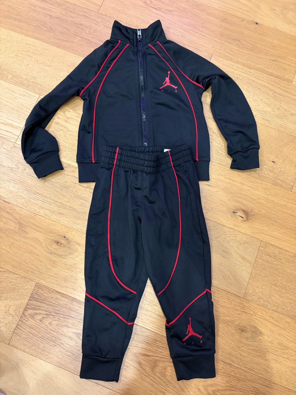 Great condition Jordan Black Kids Tracksuit with Red Trim